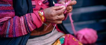 Old woman knitting in south america