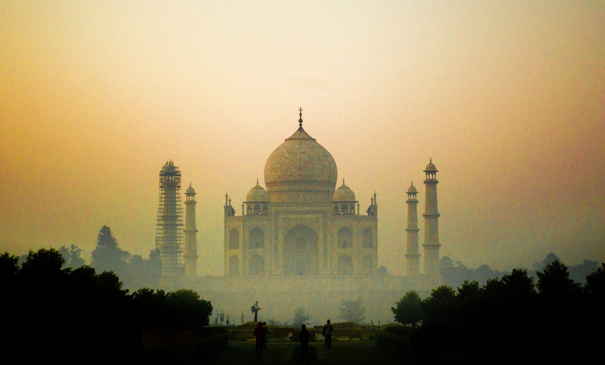 The Taj Mahal at dawn in mist