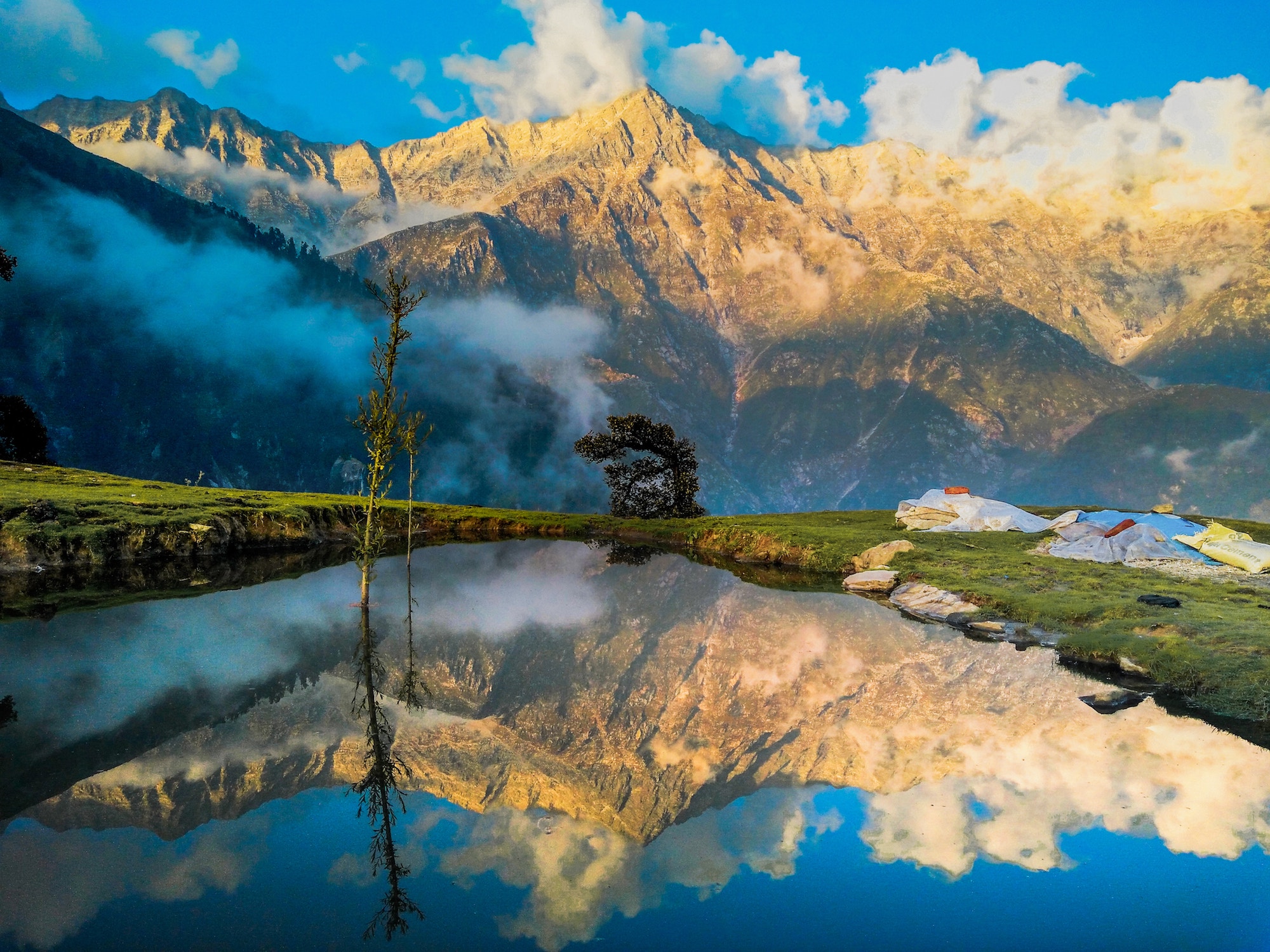 Mountains reflected in a lake in India