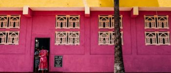 A brightly coloured pink and yellow building in Sri Lanka