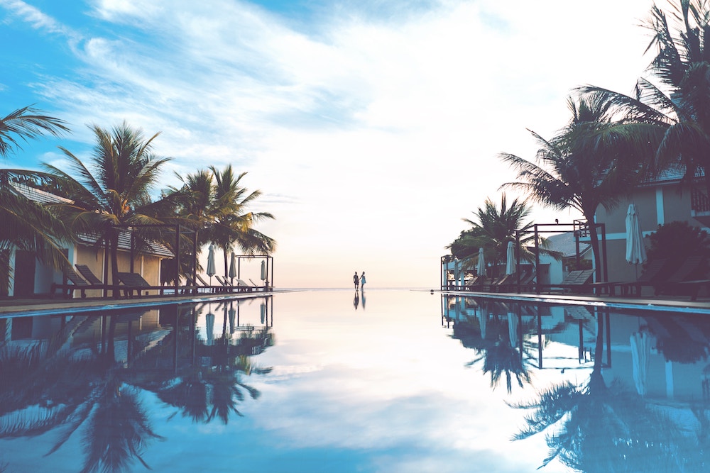 Sunset over a calm pool at a hotel in Sri Lanka